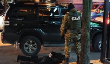 Шпигуна бойовиків видало татуювання двоголового орла