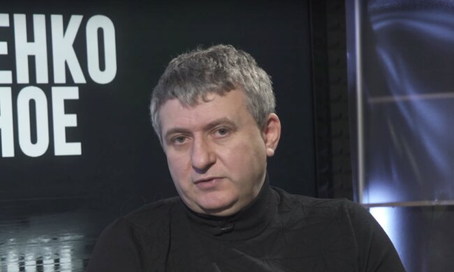 Юрий Романенко