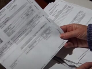 Комунальні платіжки. Фото: скрін youtube