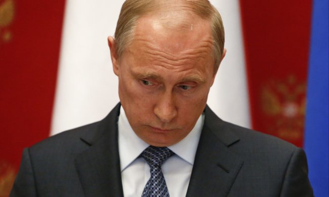 грустный Путин