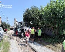 Ремонт дороги на жилмассиве Мирный в Днепре