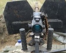 Російські окупанти заховали арсенал зброї під Троїцьким