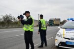Поліцейські з камерою контроль швидкості