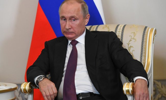 путін