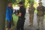 Полиция и ТЦК. Фото: скрин youtube