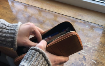 Гаманець, гроші. Фото: скрін youtube