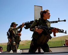 Как сирийские женщины воюют с оружием в руках (фото)