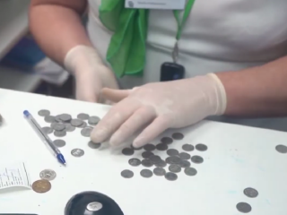 Монети. Фото: скрін youtube