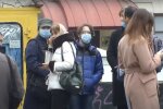 люди в масках, скріншот з відео