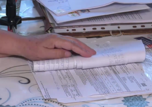 Платіжки за комуналку. Фото: скрін youtube