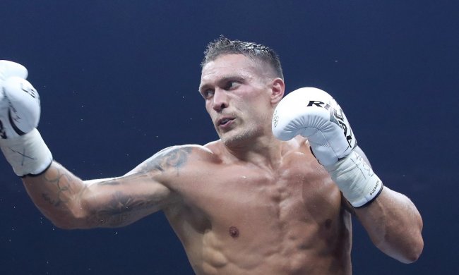 Усик начал готовиться к бою с Поветкиным, взяв в руки ружье