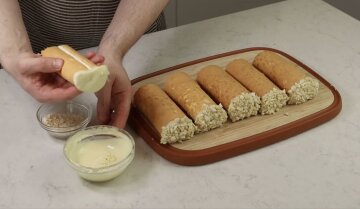 Апельсинові бісквітні рулетики з вершками: фото скрін Ютуб