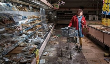 Повернення жителів Фукусіми в Примарне місто  (фото)