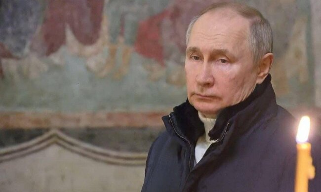 Владимир путин на Сочельник в соборе, кадр из видео