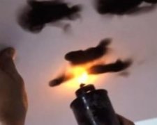 Канадец рисует свои шедевры свечой (видео)