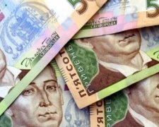 Гривня "присідає" перед новим стрибком