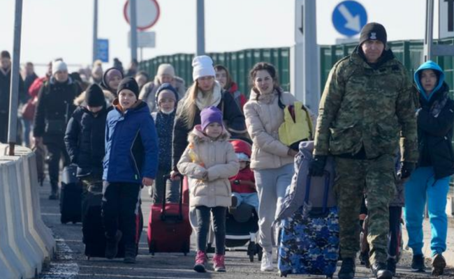 Українські біженці на кордоні Польщі. Фото: АР