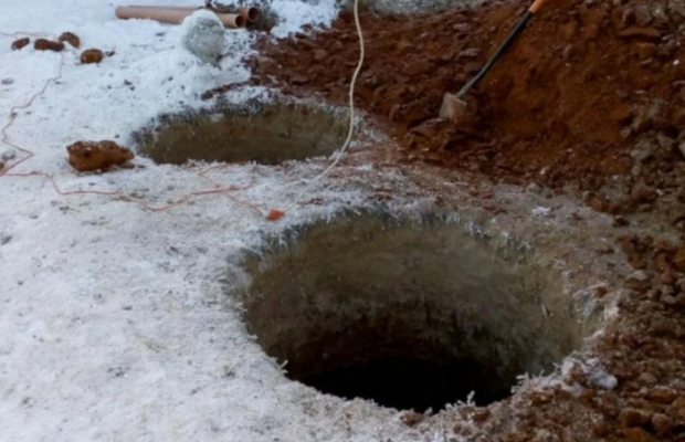 Як швидко очистити вигрібну яму взимку без відкачування: перевірені методи для приватного будинку