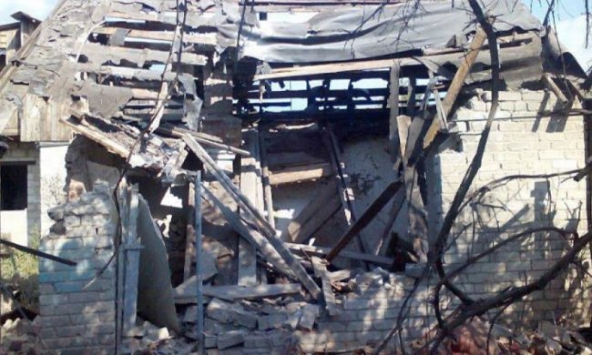 Варварские обстрелы российскими боевиками Сартаны (фото)