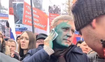 Марш Нємцова: Касьянова облили зеленкою