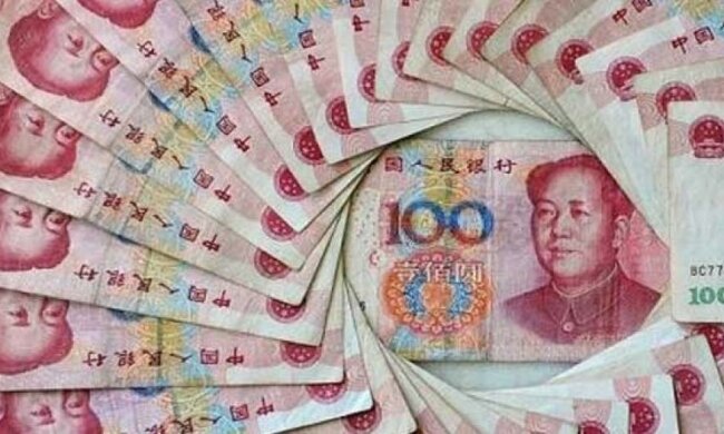 Китаец покромсал 21 тысячу долларов 