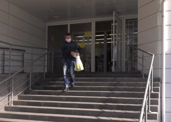 Покупки в супермаркете, кадр из видео