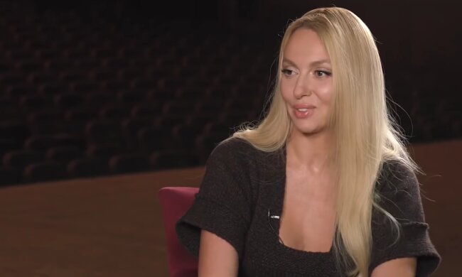 Оля Полякова, кадр из видео