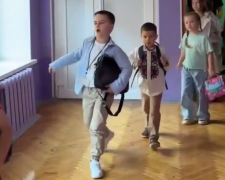 Діти, школярі, кадр з відео