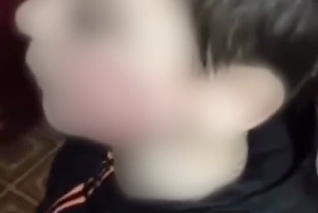 Избиение ребенка в садике, кадр из видео
