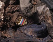 На Донбасі знайшли таємний цвинтар бойовиків: моторошні кадри