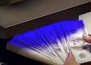 Доллары. Фото: Youtube