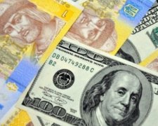 Нацбанк послабив гривню до 21,99