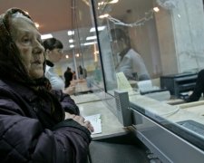 Українці переплачуватимуть за комуналку ще й Ощадбанку