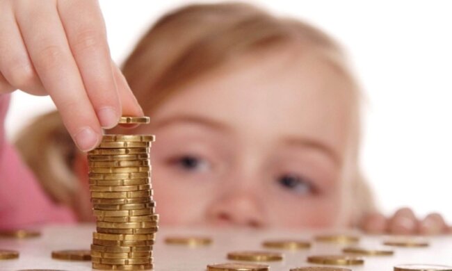 Дитина та гроші: фото з вільних джерел