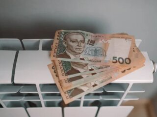 Оплата комуналки, гроші / фото: depositphotos