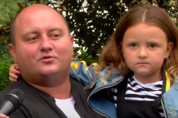 Юрий Ткач с дочерью. Фото: скрин youtube