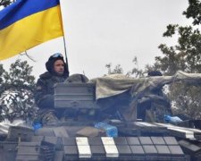 Украинские военные завершили первый этап отвода вооружения в зоне АТО (фото)