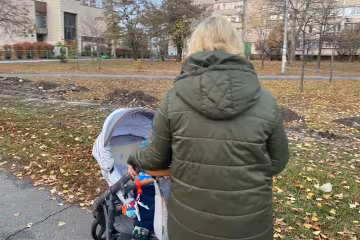 Женщина с ребенком, фото: Знай.ua