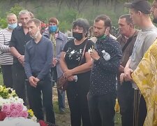 похорон, скріншот з відео