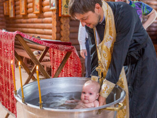 Крещение ребенка / фото: Преса