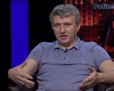 политолог Юрий Романенко