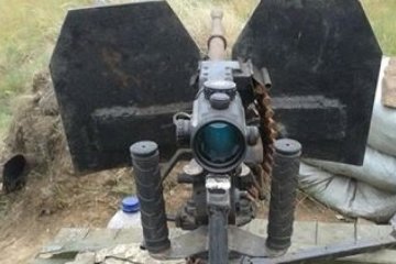 Російські окупанти заховали арсенал зброї під Троїцьким