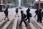 Люди зимой. Фото: The New York Times