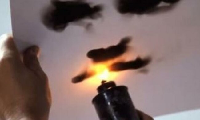 Канадец рисует свои шедевры свечой (видео)