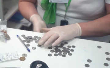 Монети. Фото: скрін youtube