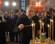 Путін взяв на богослужіння чоловіка з "ядерною валізою"
