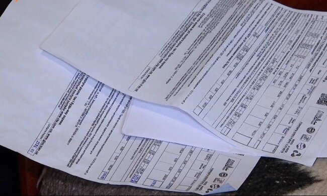 Коммунальные платежки / скриншот из видео