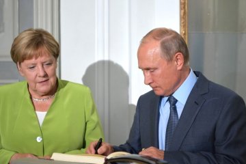 Путін зустрівся з Меркель: подробиці