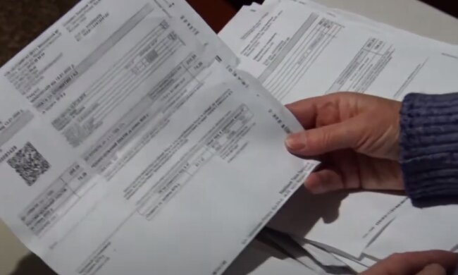 Комунальні платіжки. Фото: скрін youtube