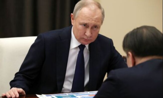 путін